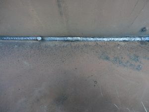 Fillet Fluxed Cored Arc Weld using a E71-T electrode and C25 shielding gas in the horizontal position.