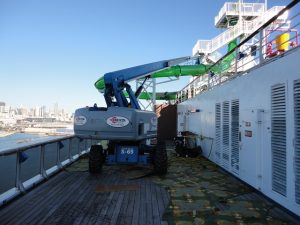 Genie S-65 on top deck of cruise ship.