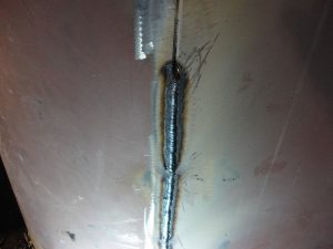 Vertical up stick weld E7018 on water tank dragging uphill