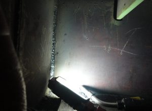 Welding vertical up with a E71-T Flux Cored electrode in a confined restricted space.
