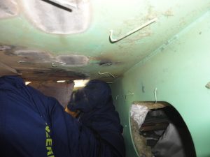 Welding in confined space on the Carnival Spirit.